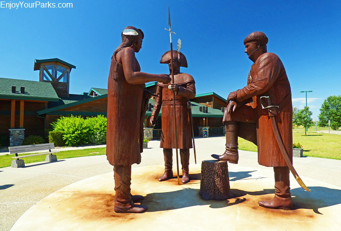 Statues of Lewis, Clark and Sacajawea standing in front of the North Dakota Interpretive Center