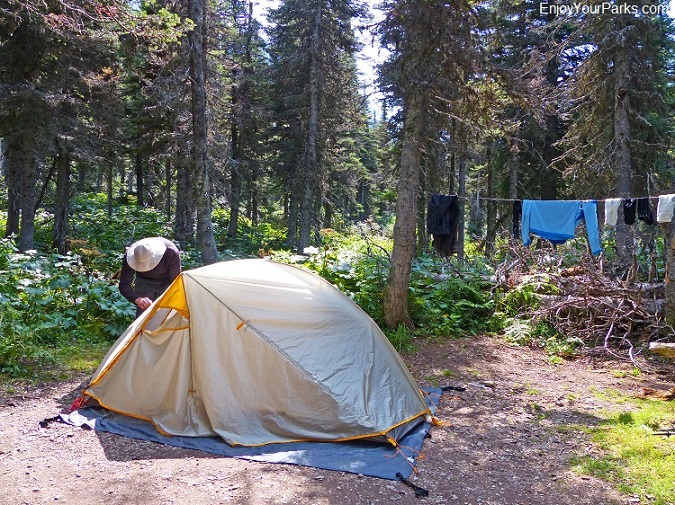 Pitching our tent at Mokowanis Lake Campground on the Stoney Indian Pass Trail.
