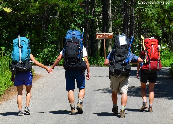 Hikers just beginning their Glacier National Park backcountry hiking adventure.
