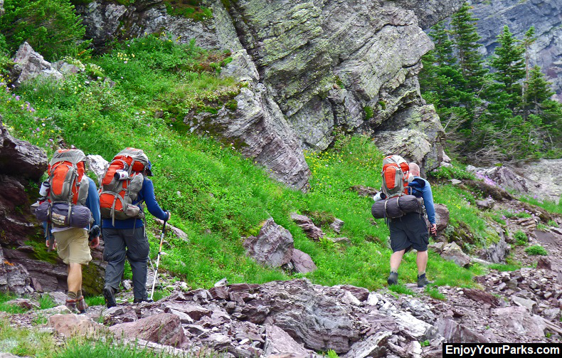 Backpackers on Gunsight Pass Trail in Glacier Park