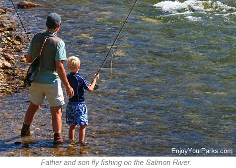 Father and son fly fishing on the Salmon River in Idaho