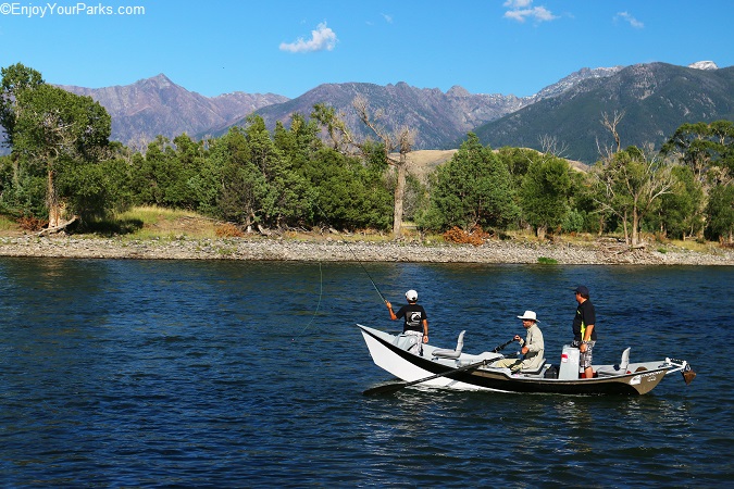 Fly fisherman using a drift boat on the Yellowstone River in Paradise Valley near Livingston.