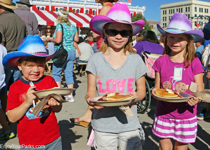 Young cow pokes enjoying the Cheyenne Frontier Days Free Pancake Breakfast